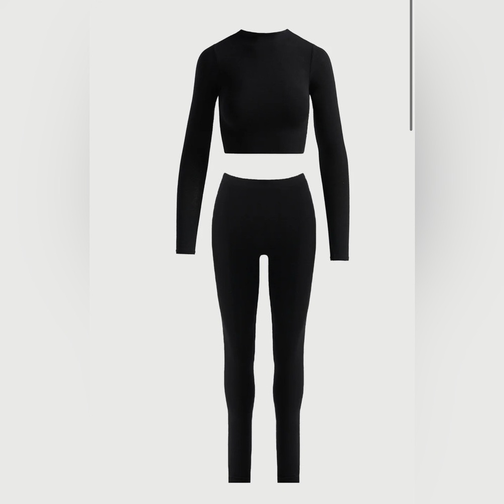 Naked Wardrobe Black High-Waisted Leggings Stretchy Fit